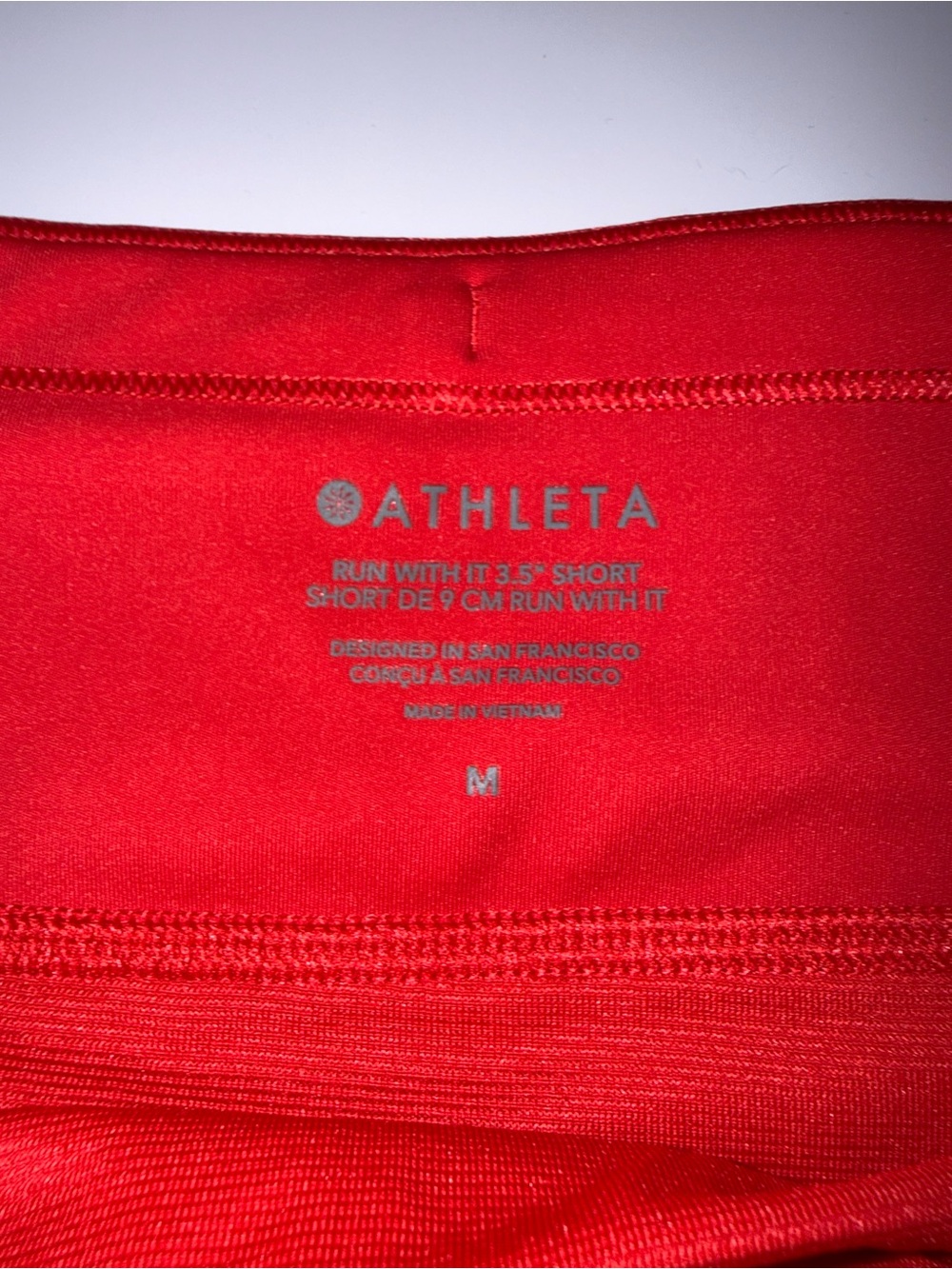 Athleta Bright Red Run With It 3.5” Shorts - Picture 2 of 3